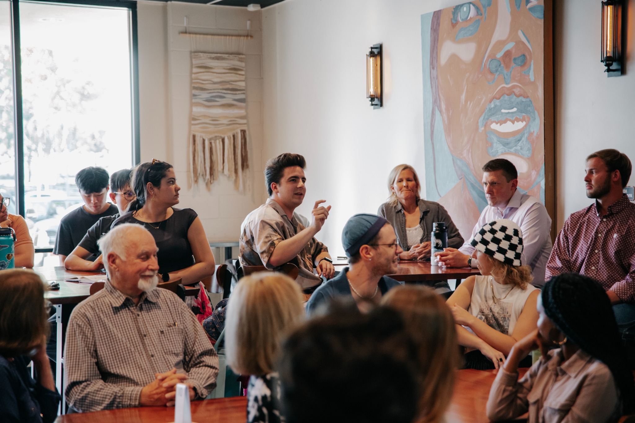 Agora attendees gathered in conversation